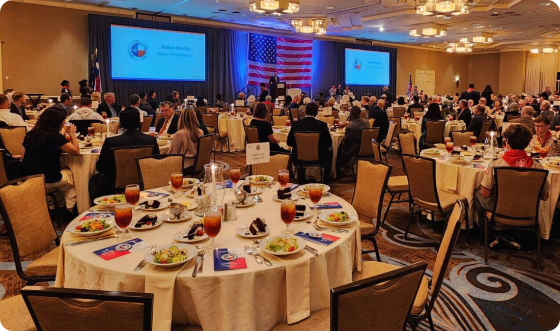 Tables at charity dinner with American flag decoration